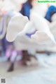 A close up of a person's feet on a bed.